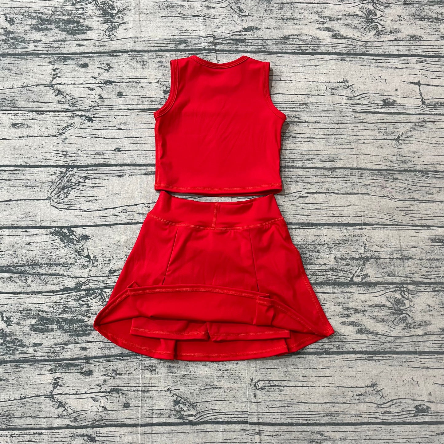 Red sleeveless top bow fold skirt girls active wear set