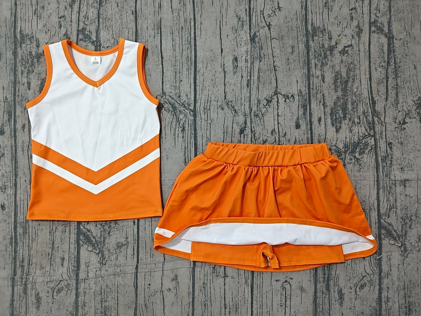 Sleeveless white orange top skirt girls team cheer active set