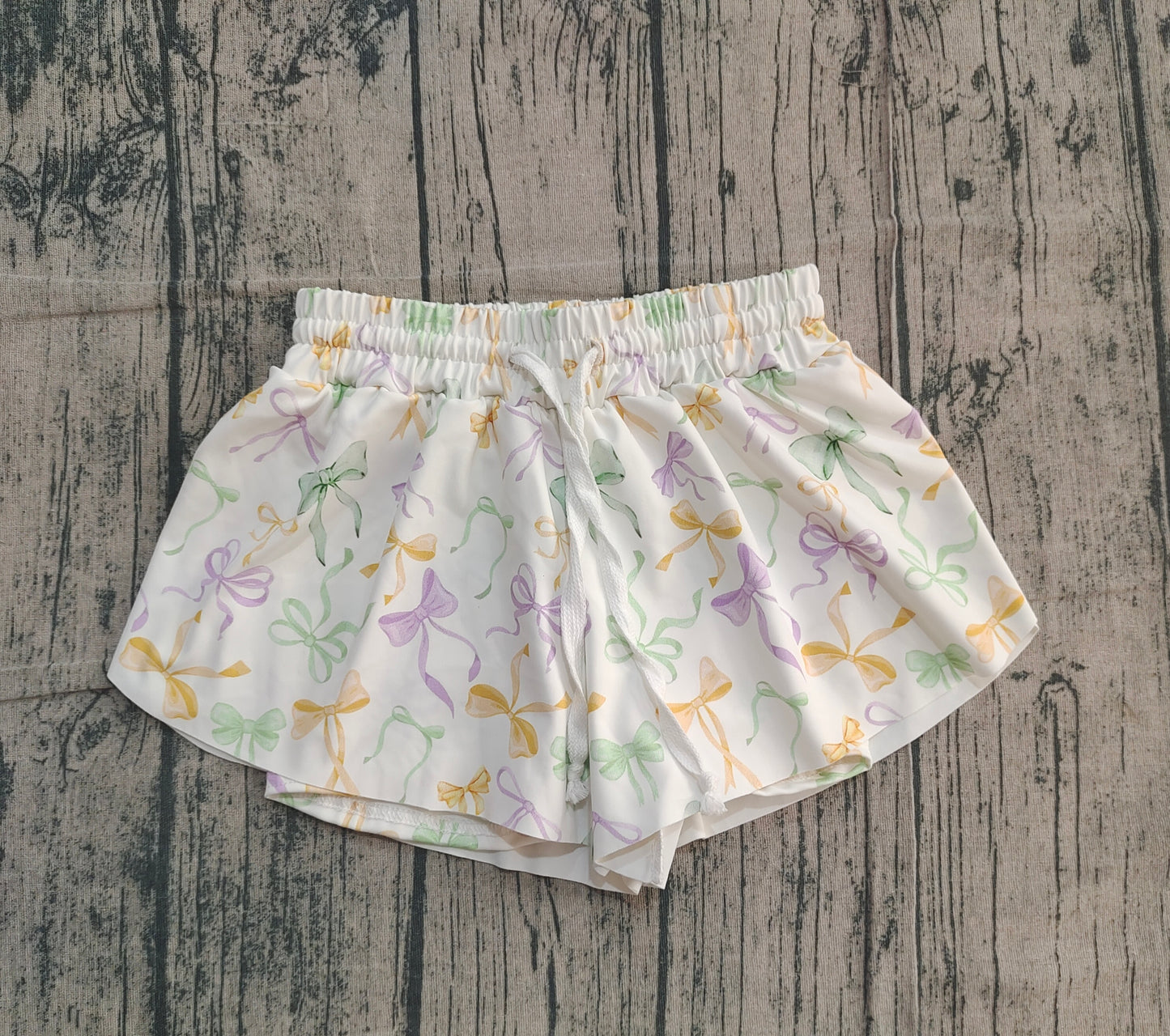 Purple green yellow bows kids girls Mardi Gras shorts