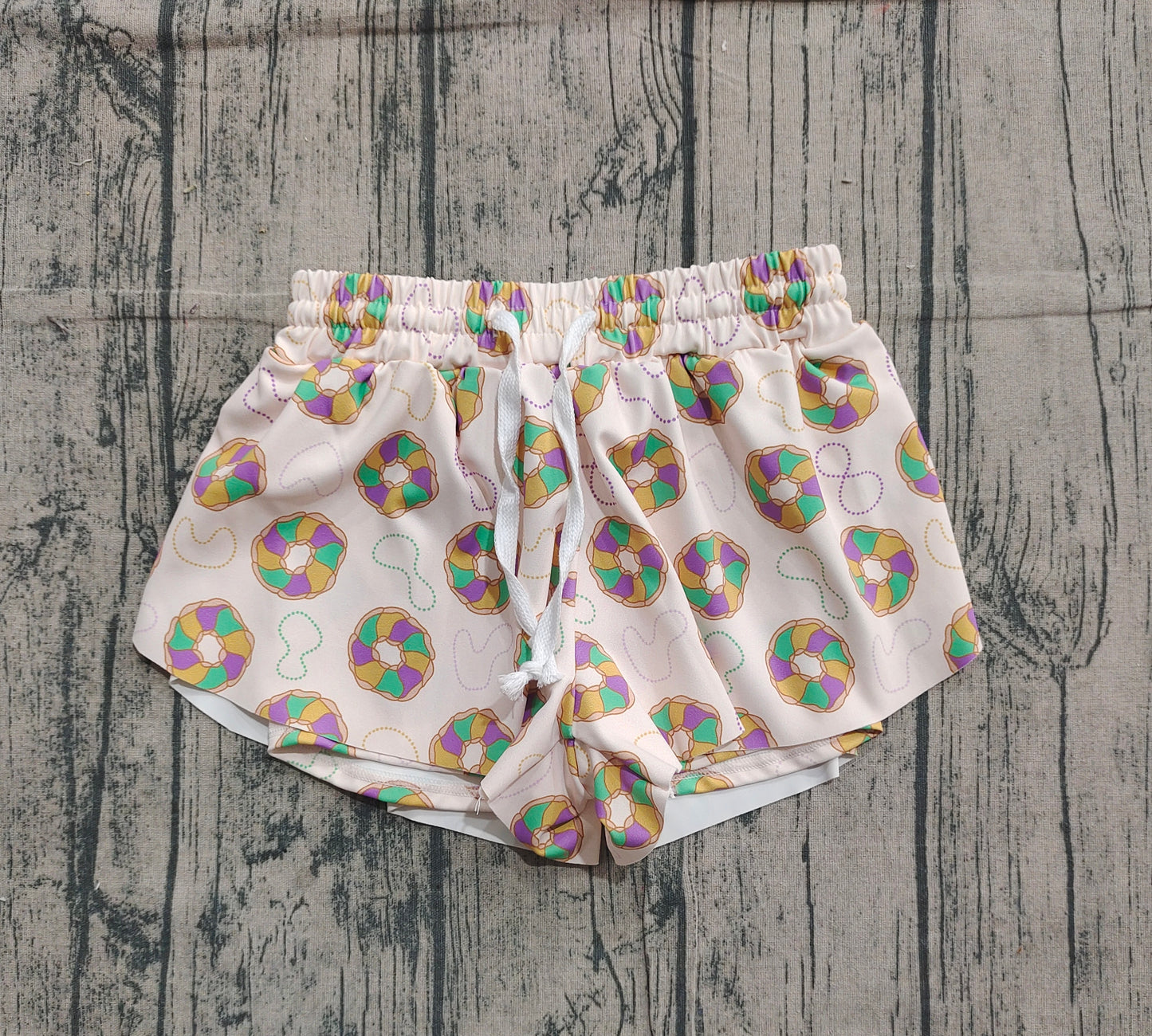 Purple green yellow donut kids girls Mardi Gras active shorts
