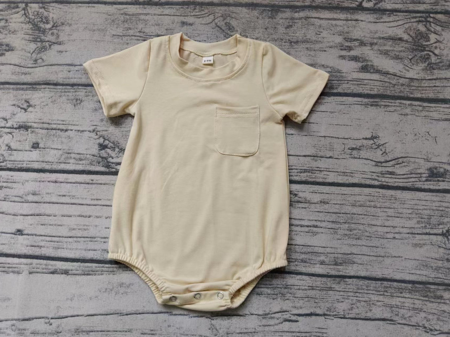 MOQ 3 pcs beige shorts sleeves pocket baby summer romper