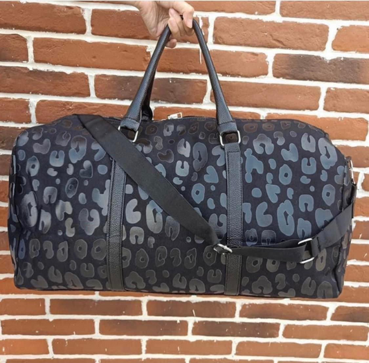 Black leopard duffel bag