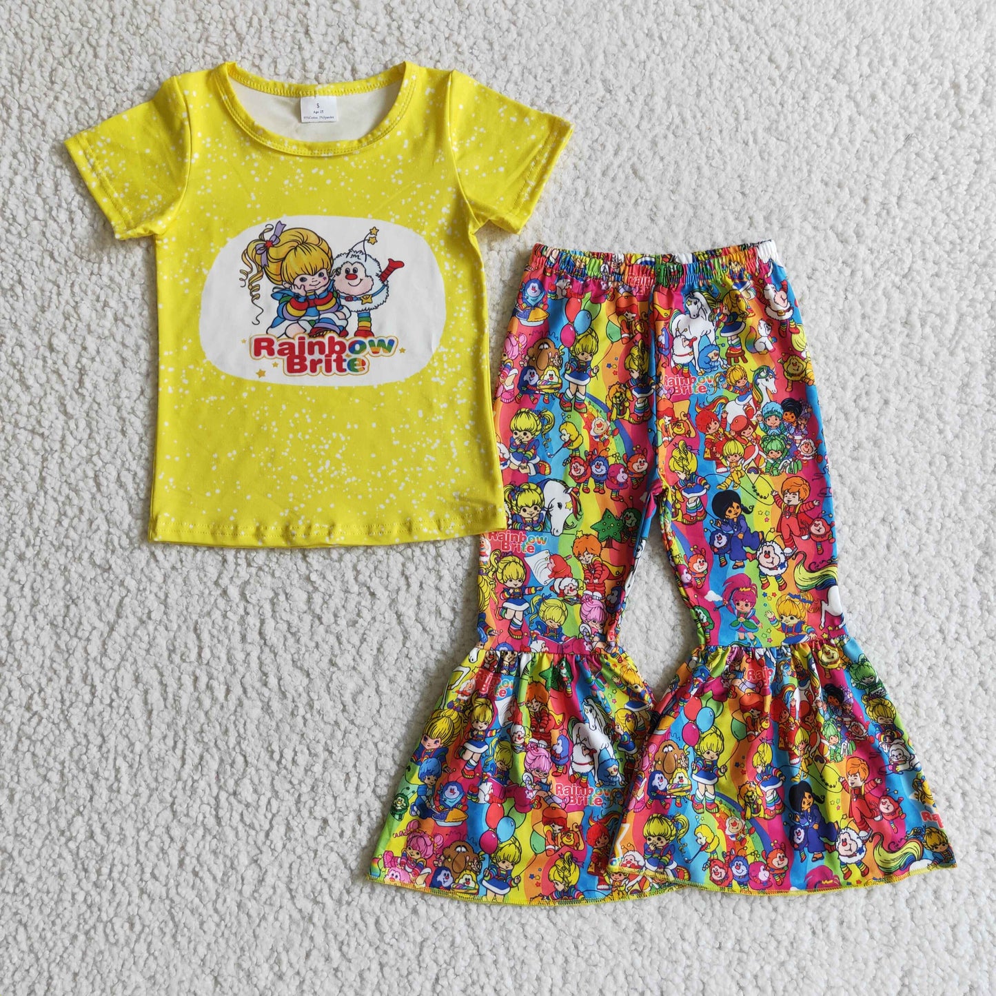 Girl rainbow yellow shirt bell bottom pants outfit