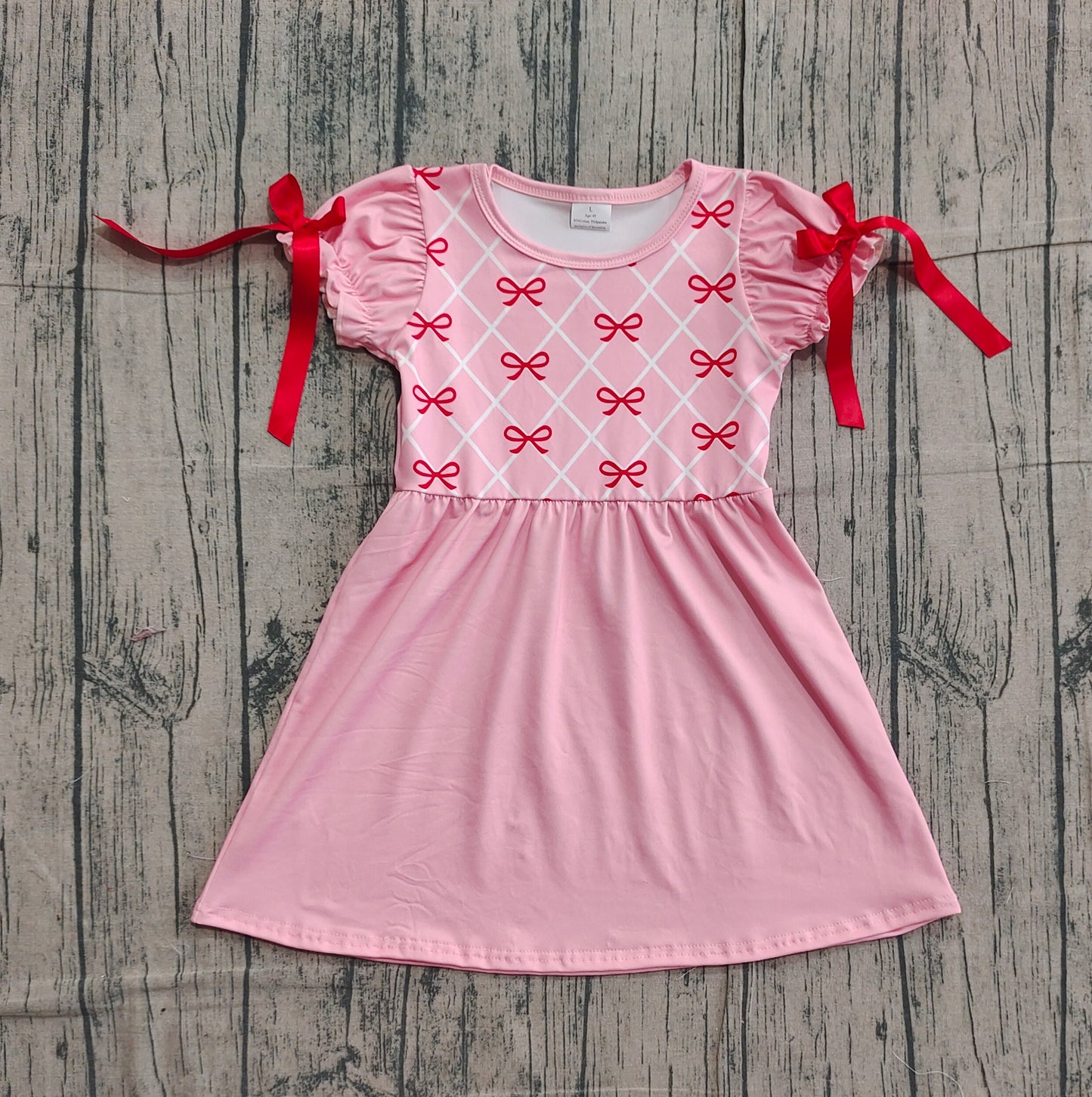 red bows girl ruffle sleeve pink dress