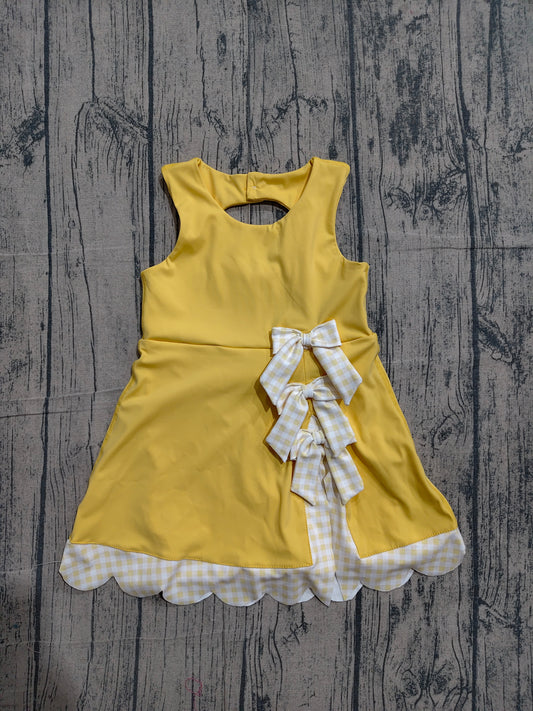 Sleeveless bow yellow scallop girls athletic dress