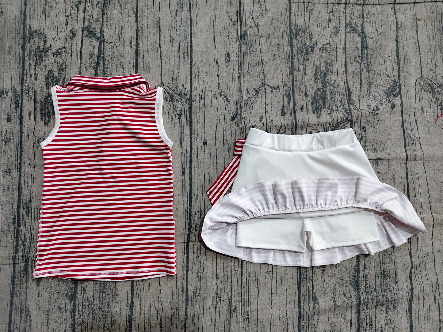 Sleeveless maroon stripe polo top skirt girls team active outfit