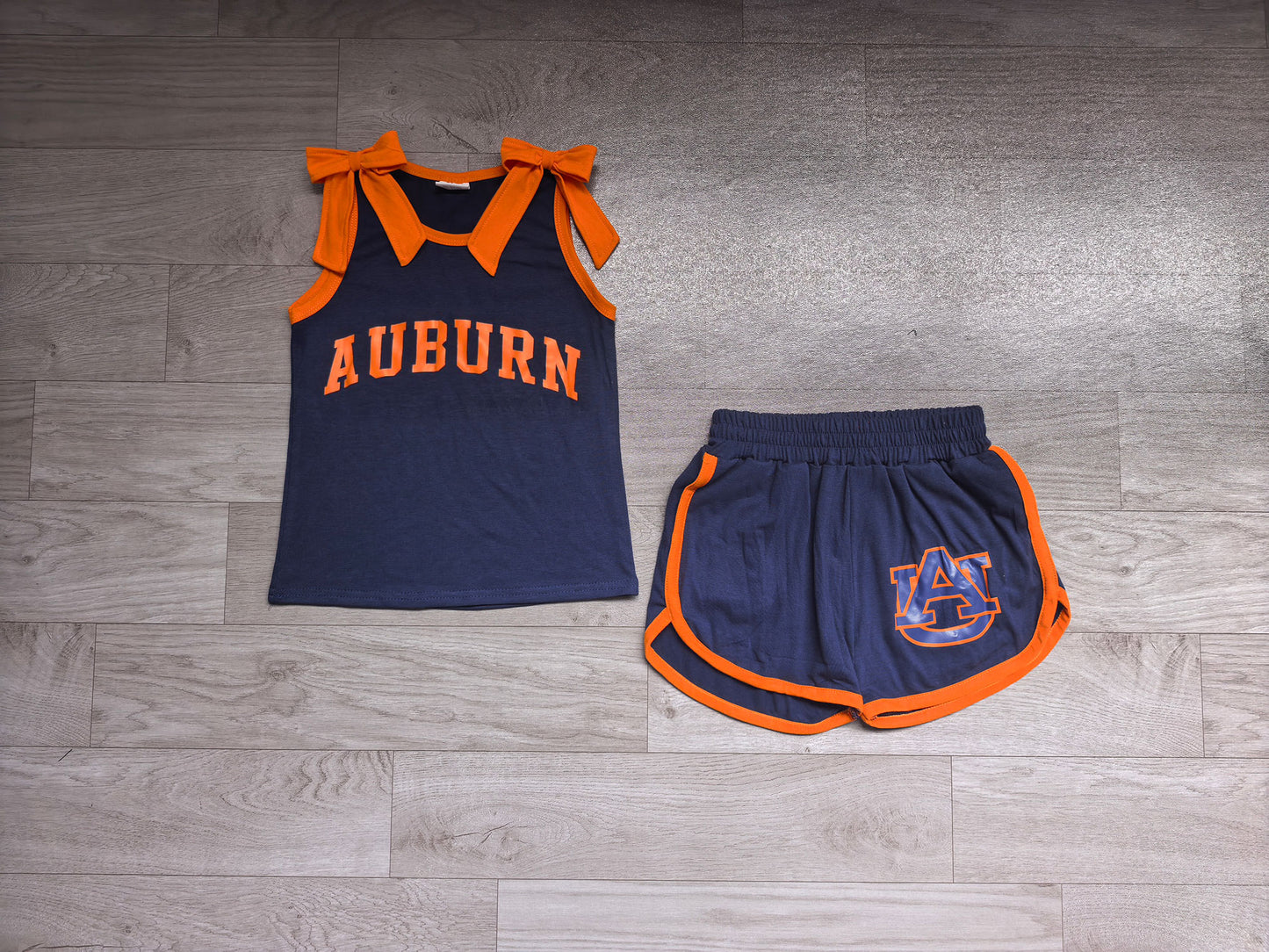 Sleeveless orange bow navy top shorts A U team girls outfits