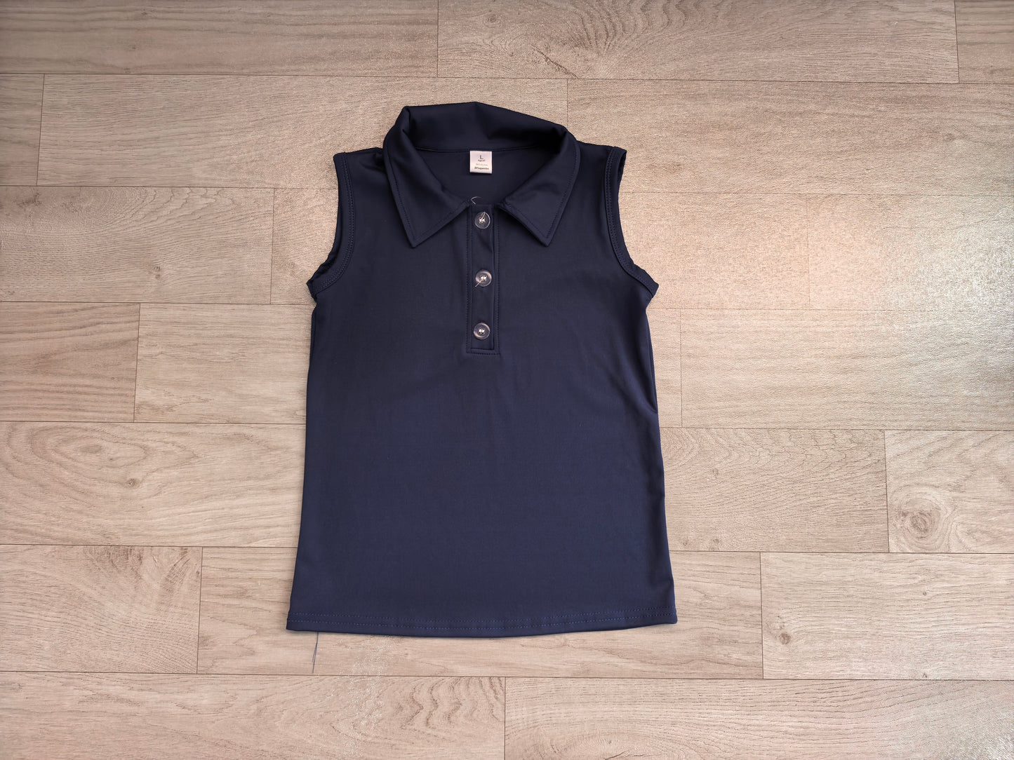 Navy sleeveless kids girls activewear polo shirt