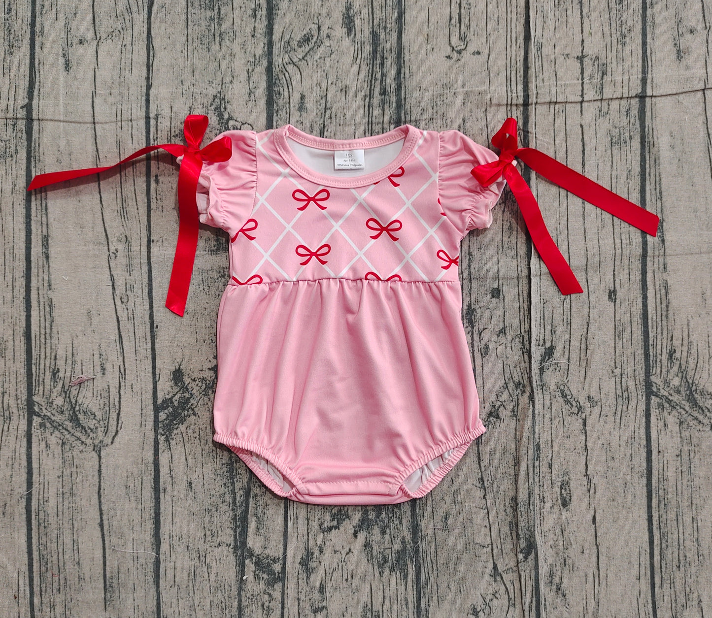 red bows print baby girl pink romper