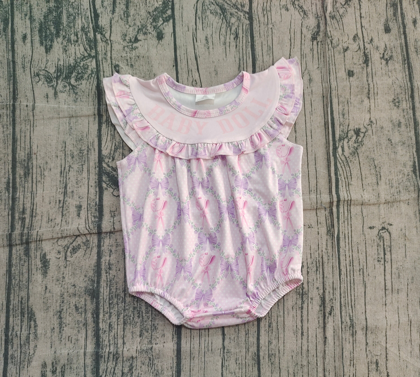 Flutter sleeves baby doll lavender bow girls romper
